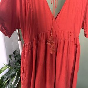 Burnt Orange V-Neck Dress with Tassel Detail